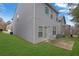 Spacious backyard with a well-maintained lawn, patio, and siding at 5456 Union Hill Ct, Union City, GA 30291