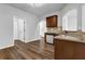 Kitchen featuring wood cabinets, granite countertops, and stainless steel appliances at 5456 Union Hill Ct, Union City, GA 30291