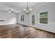 Bright living room featuring hardwood floors, natural light, and classic trim at 5456 Union Hill Ct, Union City, GA 30291