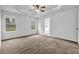 Spacious main bedroom featuring large windows and trey ceilings at 5456 Union Hill Ct, Union City, GA 30291