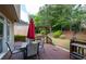 Back deck with outdoor seating, pergola and views of the backyard at 772 Vinings Estates Se Dr, Mableton, GA 30126