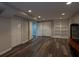 Finished basement featuring wood-look flooring, recessed lighting, and ample closet and storage space at 772 Vinings Estates Se Dr, Mableton, GA 30126