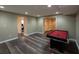 Finished basement featuring wood-look flooring and a pool table for recreation at 772 Vinings Estates Se Dr, Mableton, GA 30126