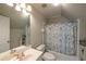 Bathroom with tub/shower combination and vanity sink at 772 Vinings Estates Se Dr, Mableton, GA 30126