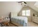 Bedroom with vaulted ceiling, desk and lots of natural light at 772 Vinings Estates Se Dr, Mableton, GA 30126