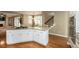 Beautiful kitchen with granite countertops and stainless steel appliances and views to the dining and living area at 772 Vinings Estates Se Dr, Mableton, GA 30126
