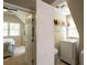 Convenient laundry room with modern washer and dryer, next to bedroom at 772 Vinings Estates Se Dr, Mableton, GA 30126