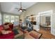 Bright and spacious sunroom featuring French doors, a built-in desk and hardwood floors at 772 Vinings Estates Se Dr, Mableton, GA 30126