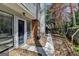 Home with fenced-in backyard, walkway, and mature trees at 1335 Jamestowne Trl, Alpharetta, GA 30009