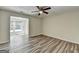 Large bedroom with an adjacent sitting room with multiple windows for plenty of natural light at 1335 Jamestowne Trl, Alpharetta, GA 30009