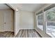Bright bedroom with updated flooring, fresh paint, and a double window at 1335 Jamestowne Trl, Alpharetta, GA 30009