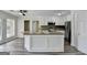 Bright kitchen featuring stainless steel appliances, island with breakfast bar, and lots of cabinet space at 1335 Jamestowne Trl, Alpharetta, GA 30009
