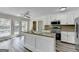 Bright kitchen featuring stainless steel appliances, island with breakfast bar, and lots of cabinet space at 1335 Jamestowne Trl, Alpharetta, GA 30009