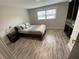 Well-lit bedroom with built-in wardrobe and a soothing, contemporary color palette at 1888 Peeler Rd, Dunwoody, GA 30338