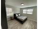 Window-filled bedroom with built-in storage offers bright, uncluttered living at 1888 Peeler Rd, Dunwoody, GA 30338