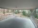 Back patio overlooking backyard views at 1888 Peeler Rd, Dunwoody, GA 30338