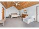 Bright main bedroom boasts wood vaulted ceilings and an oversized sitting area at 4192 Loch Highland Ne Pkwy, Roswell, GA 30075