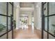Elegant foyer featuring hardwood floors, staircase, and an open layout that creates a grand entrance at 5915 Brookgreen Rd, Atlanta, GA 30328