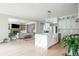 Open concept kitchen with white cabinets, stainless steel appliances, and a large island with seating at 5915 Brookgreen Rd, Atlanta, GA 30328