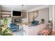 Spacious open-concept living room with plush seating, hardwood floors, and modern accents at 5915 Brookgreen Rd, Atlanta, GA 30328