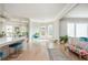Open floor plan showcases the kitchen, dining, and seating area with hardwood floors at 5915 Brookgreen Rd, Atlanta, GA 30328