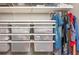 Organized walk-in closet with shelves, storage bins, and hanging rods for clothing and accessories at 5915 Brookgreen Rd, Atlanta, GA 30328