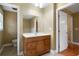 Bathroom showcasing a wooden vanity, large mirror and ample lighting for a functional space at 1025 Pace Rd, Hiram, GA 30141
