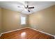 Empty bedroom featuring wood floors, a window, and neutral paint at 1025 Pace Rd, Hiram, GA 30141