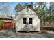 Exterior view of a shed/outbuilding in the backyard with double doors and access to deck at 1025 Pace Rd, Hiram, GA 30141