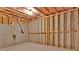 Unfinished basement with concrete foundation and wooden framing awaiting customization at 1054 Mackets Ct, Atlanta, GA 30354