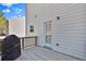 Back deck with space for cooking and relaxing in the private outdoor space at 1054 Mackets Ct, Atlanta, GA 30354