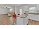 Bright, white kitchen with stainless steel appliances, granite countertops, and a breakfast bar at 1054 Mackets Ct, Atlanta, GA 30354