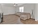 Spacious living room with wood floors and a comfortable sectional sofa at 1054 Mackets Ct, Atlanta, GA 30354