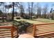 Large lawn and small storage building, as viewed from the deck at 2110 E Cherokee Dr, Woodstock, GA 30188