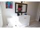 Bright bathroom featuring a modern vanity and patterned tile floors at 2110 E Cherokee Dr, Woodstock, GA 30188