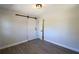 Bedroom with hardwood flooring, sliding barn door, and natural lighting at 2110 E Cherokee Dr, Woodstock, GA 30188