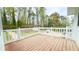 Back deck overlooking fenced backyard and mature trees at 4083 Rivermeade Sw Dr, Lilburn, GA 30047