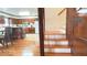 Inviting foyer with hardwood floors and stairs leading to the upper level at 4083 Rivermeade Sw Dr, Lilburn, GA 30047