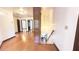 Spacious hallway with hardwood floors leading to other rooms in the home at 4083 Rivermeade Sw Dr, Lilburn, GA 30047