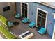 Outdoor community patio featuring fire pit, privacy hedges, and elegant chairs and furniture sets at 795 Hammond Dr # 407, Sandy Springs, GA 30328