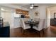 Dining area features a round table with four chairs, plus access to the kitchen at 795 Hammond Dr # 407, Sandy Springs, GA 30328