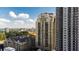Tall luxury condo building featuring balconies with city views at 795 Hammond Dr # 407, Sandy Springs, GA 30328