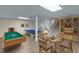Spacious finished basement featuring a pool table, ping pong table, and unique bar area at 2715 Brook Valley Dr, Cumming, GA 30041