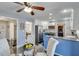 Charming kitchen featuring white upper cabinets and blue lower cabinets, with stainless steel appliances at 2715 Brook Valley Dr, Cumming, GA 30041
