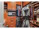 Organized walk-in closet with custom shelving, hanging racks, and plenty of storage space at 3324 Peachtree Ne Rd # 2807, Atlanta, GA 30326