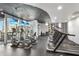 Modern gym featuring treadmills and elliptical machines with scenic views, ideal for an energizing workout at 3324 Peachtree Ne Rd # 2807, Atlanta, GA 30326