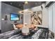 Modern common area with a round table, wall art, and a large-screen TV at 3324 Peachtree Ne Rd # 2807, Atlanta, GA 30326