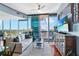 Bright living room with large windows, hardwood floors, and contemporary furnishings offers stunning city views at 3324 Peachtree Ne Rd # 2807, Atlanta, GA 30326