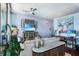 Comfortable living room features hardwood floors, modern decor, and opens to a dedicated work space at 3324 Peachtree Ne Rd # 2807, Atlanta, GA 30326