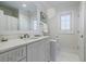 Bright bathroom featuring white vanity, modern fixtures and tiled floor at 3790 Narmore Ne Dr, Atlanta, GA 30319